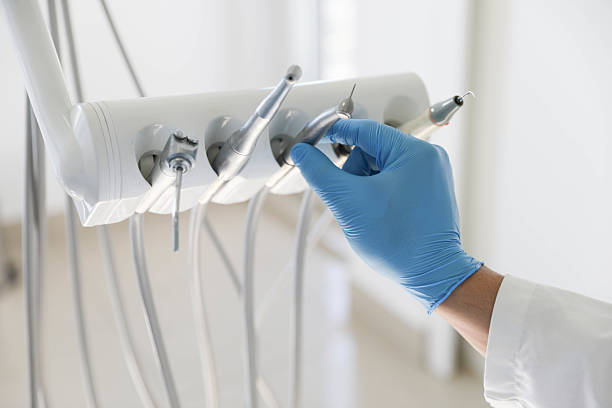 Professional Tooth Extraction technician working in Montgomery County County, NC